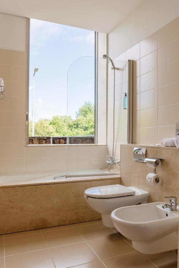 Habitación Doble con cama supletoria para adulto - 1 o 2 camas